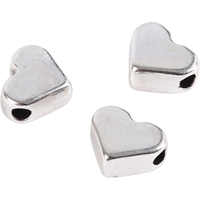 Perle espaceur, dim. 5,5x7 mm, diamètre intérieur 1 mm, argenté, 3 pièces/ 1 Pq.