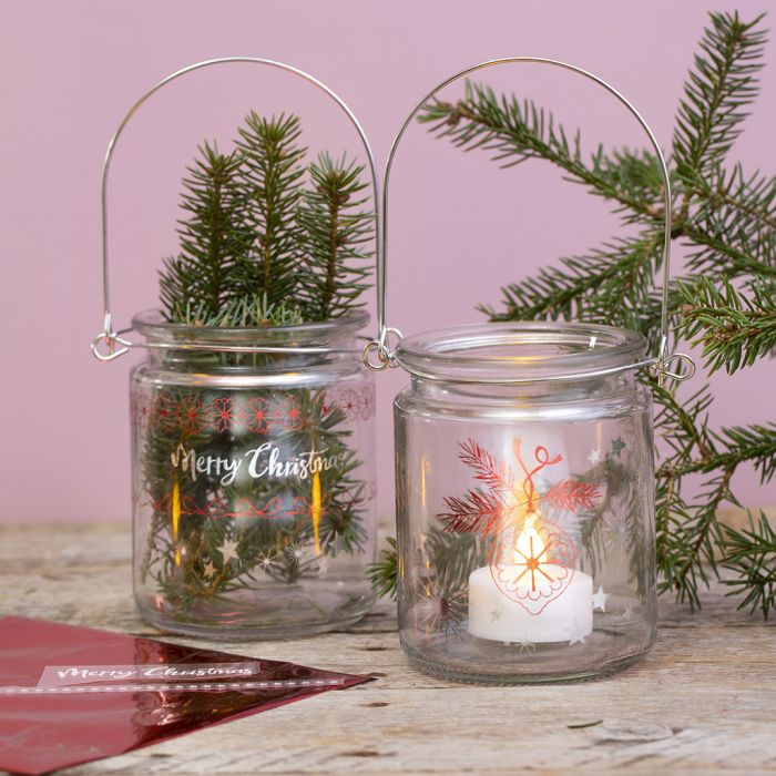 Lampions en verre décorés avec des motifs en feuille autocollante