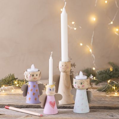 Bougeoirs en bois pour diffuser l’esprit de Noël