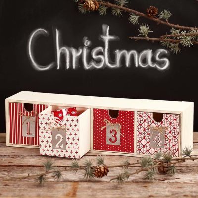 Technique de découpage sur une commode pour des cadeaux de l'Avent