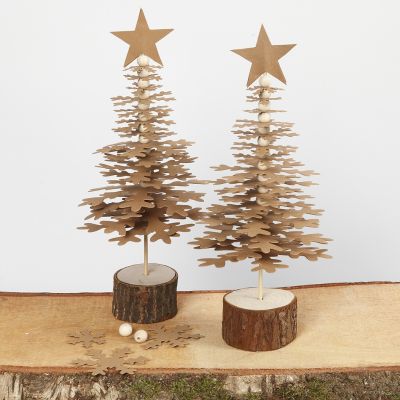 apin de Noël en formes découpées dans du papier simili-cuir