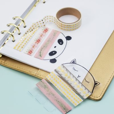 Un support de ruban de masquage en film rigide pour bullet journal et agenda.