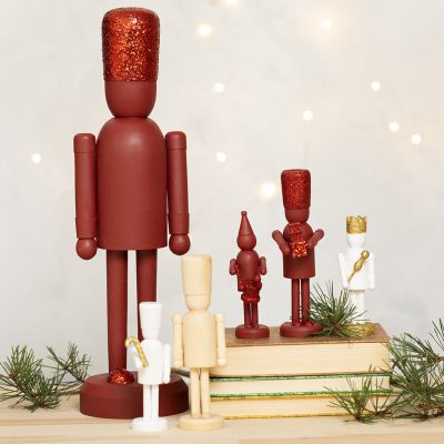 Figurines de casse-noisette en bois décorées avec des paillettes