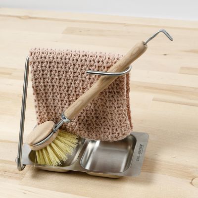 Un gant de vaisselle au crochet avec un motif style coquillage